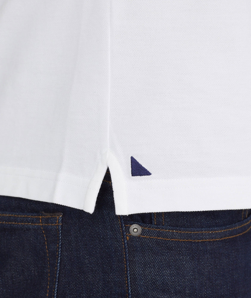Model wearing a White The Classic Pique Polo