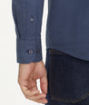 Model is wearing UNTUCKit Flannel Hemsworth Shirt in blue.