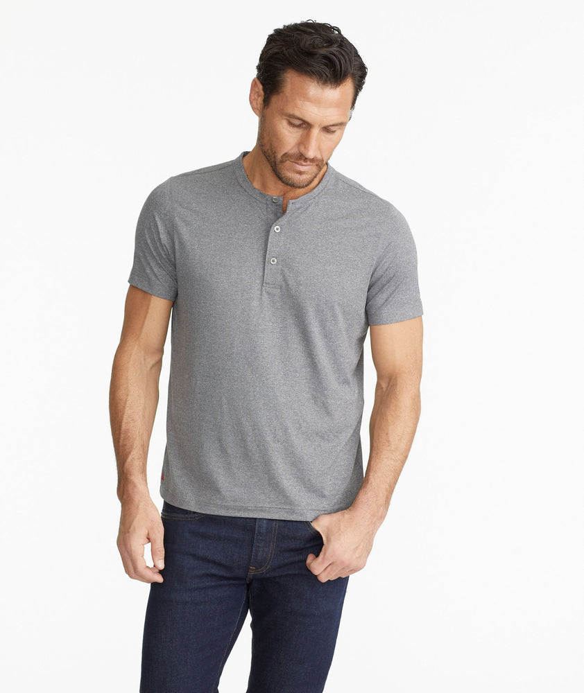 Model wearing a Grey Short-Sleeve Performance Henley