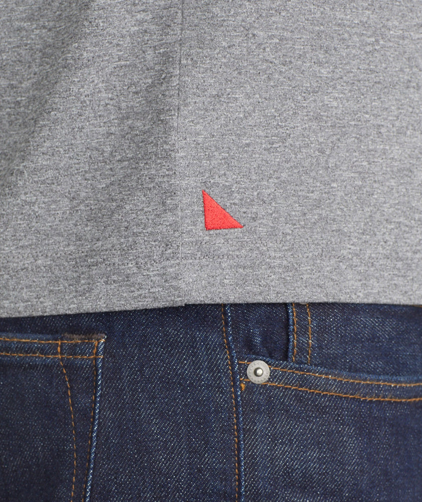 Model wearing a Grey Short-Sleeve Performance Henley