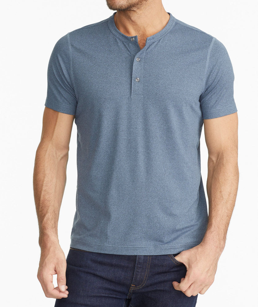 Model wearing a Blue Short-Sleeve Performance Henley