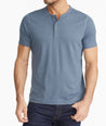 Model wearing a Blue Short-Sleeve Performance Henley
