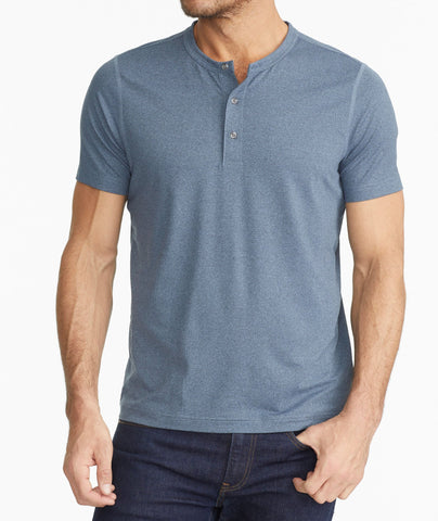 Model wearing a Blue Short-Sleeve Performance Henley