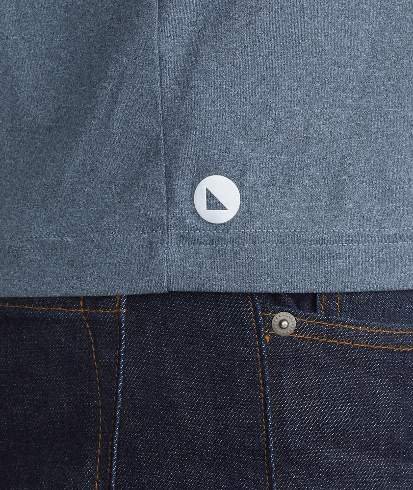 Model wearing a Blue Short-Sleeve Performance Henley