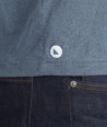 Model wearing a Blue Short-Sleeve Performance Henley