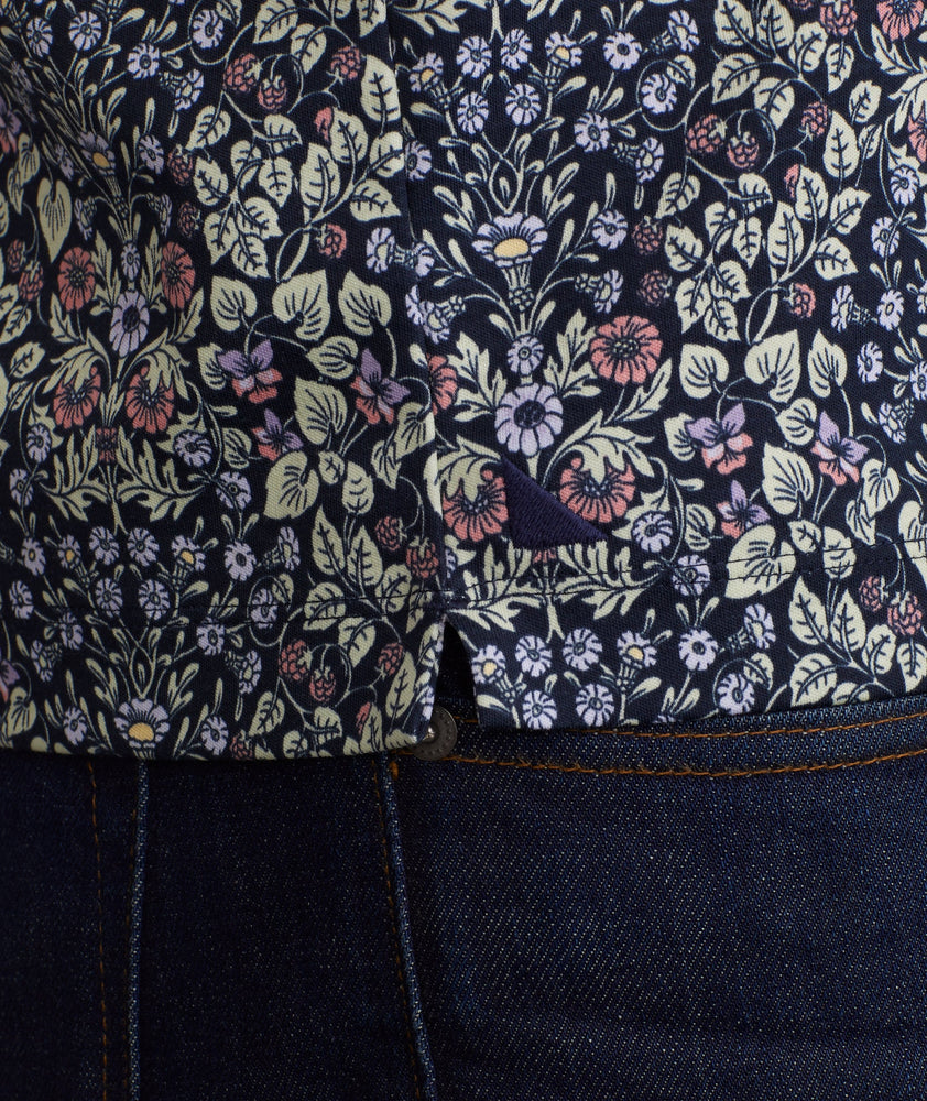 Model wearing a Navy Wrinkle-Free Polo with Floral Print