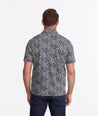 Model wearing a Navy Wrinkle-Free Polo with Floral Print