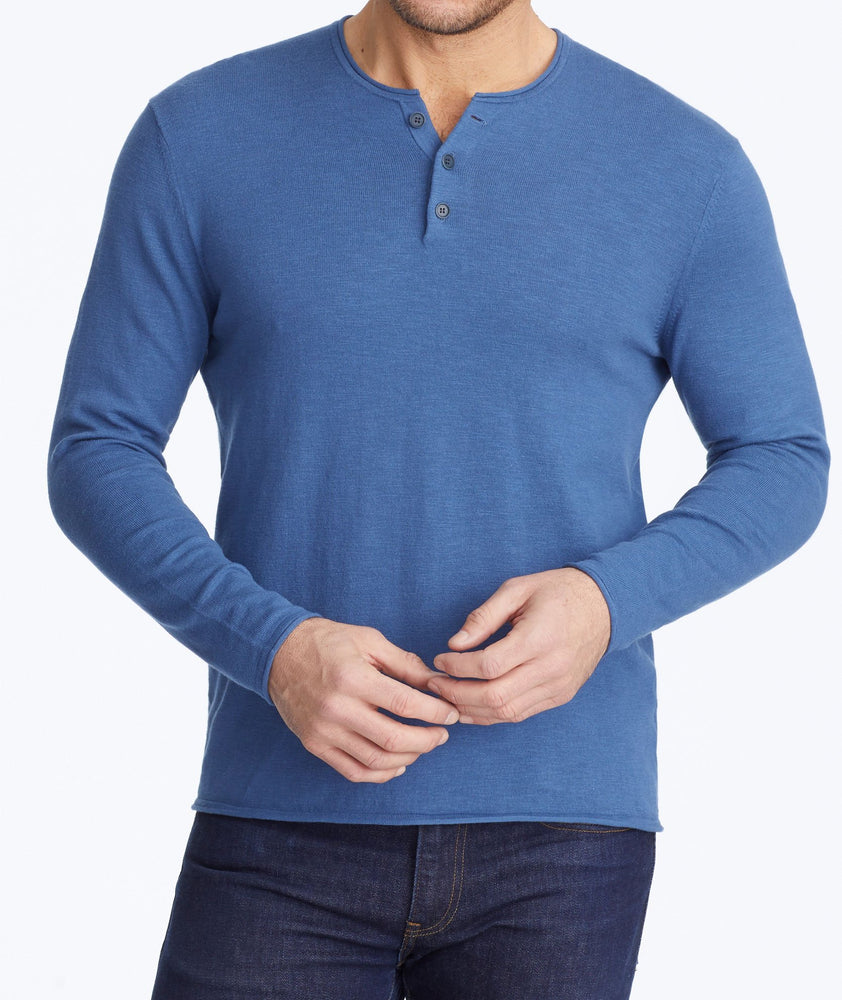 Model wearing a Navy Henley Sweater