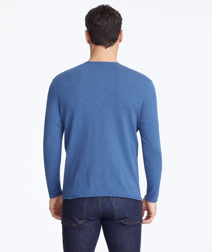 Model wearing a Navy Henley Sweater