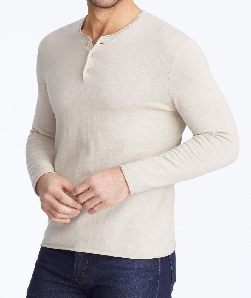 Model wearing a Tan Henley Sweater