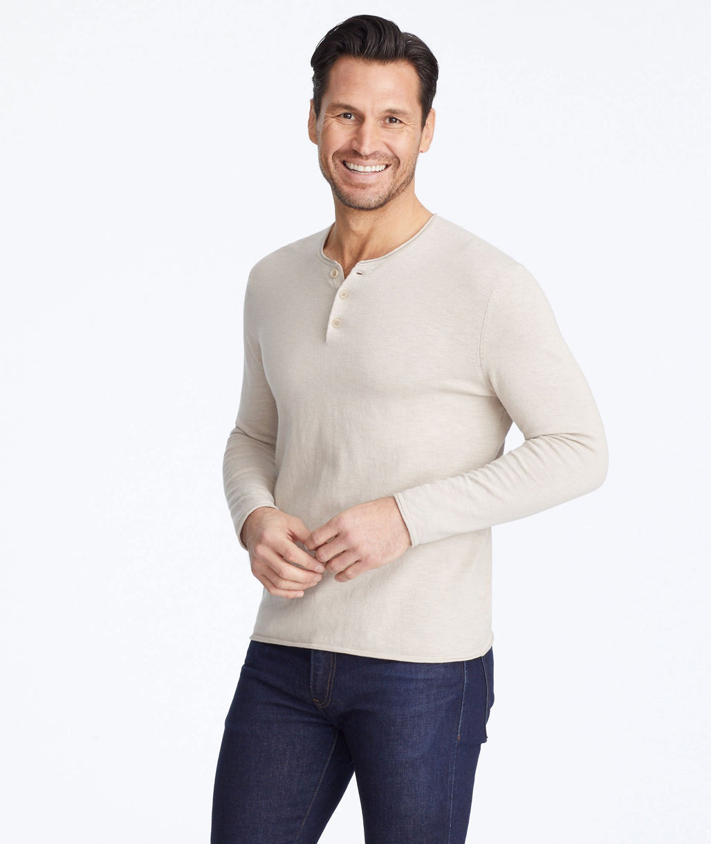 Model wearing a Tan Henley Sweater