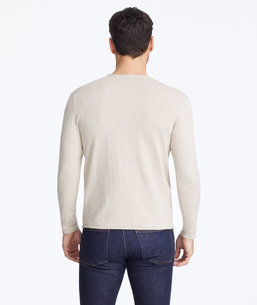 Model wearing a Tan Henley Sweater