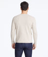 Model wearing a Tan Henley Sweater