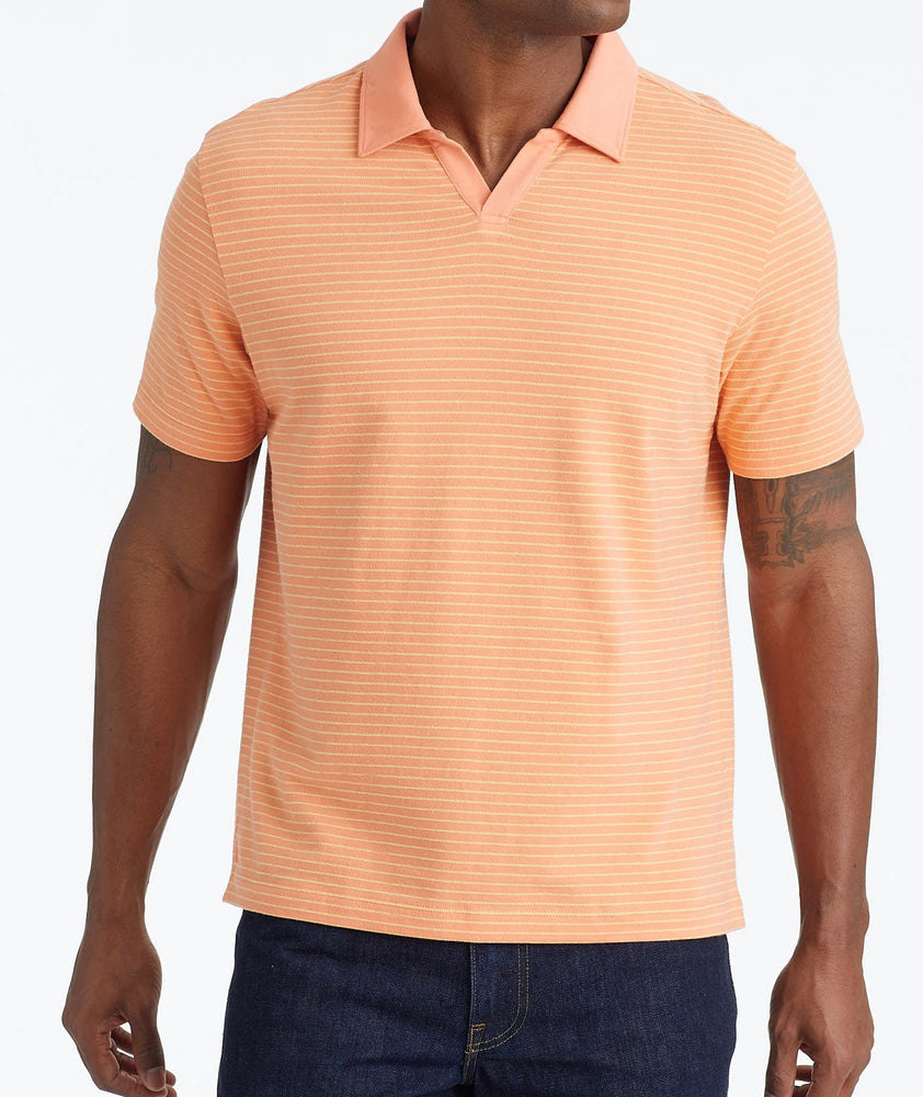 Model wearing a Orange Johnny Collar Polo