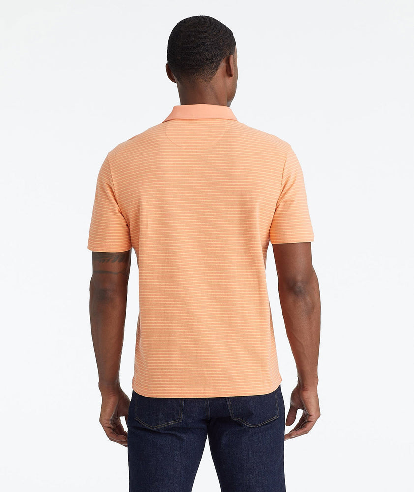 Model wearing a Orange Johnny Collar Polo