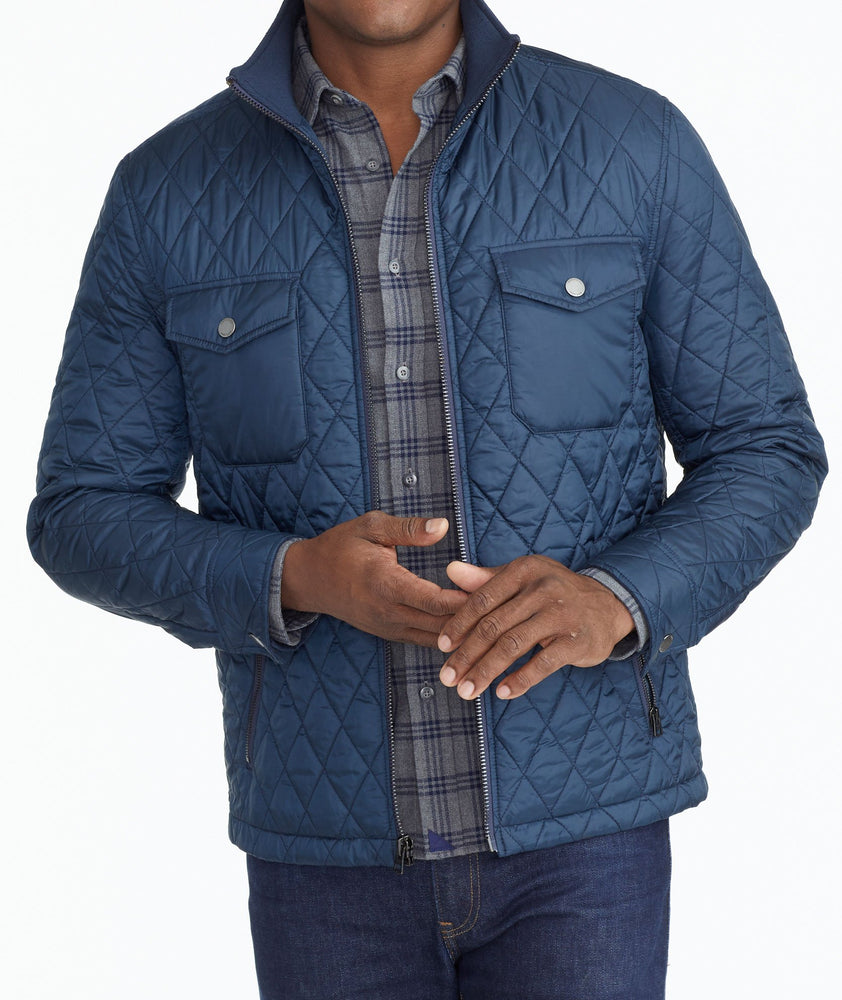 Model wearing a Navy Quilted City Jacket
