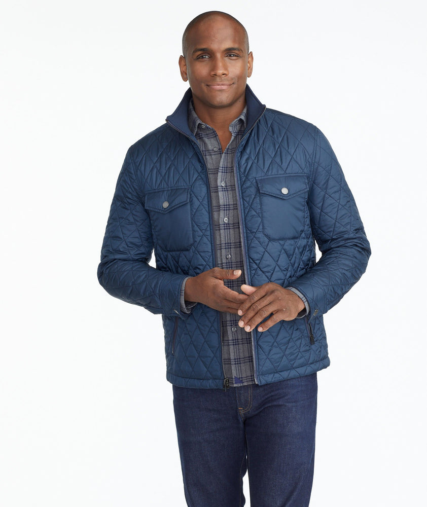 Model wearing a Navy Quilted City Jacket