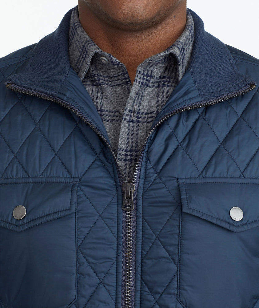 Model wearing a Navy Quilted City Jacket