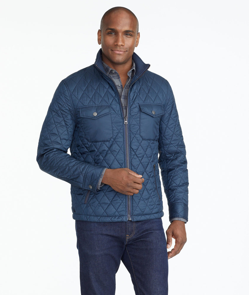 Model wearing a Navy Quilted City Jacket