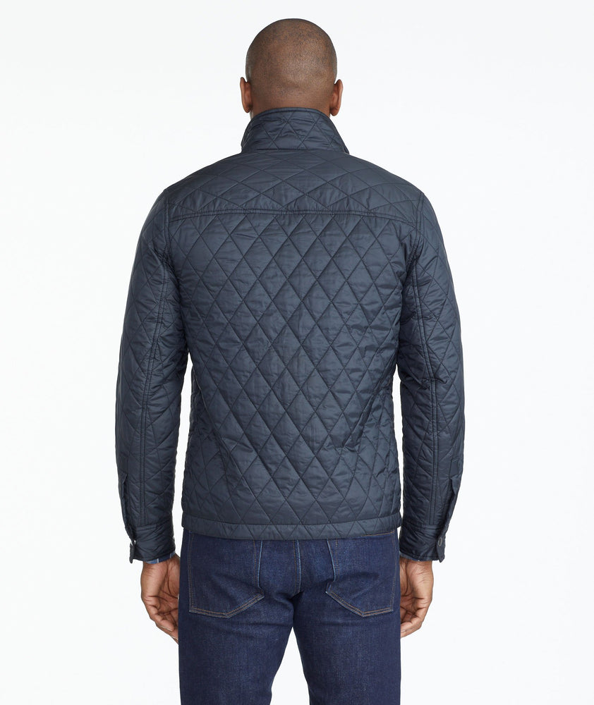 Model wearing a Dark Grey Quilted City Jacket