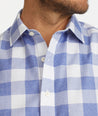 Model wearing a Blue Wrinkle-Free Rian Shirt