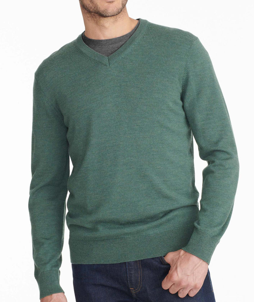 Model wearing a Dark Green Merino-Wool V-Neck Sweater