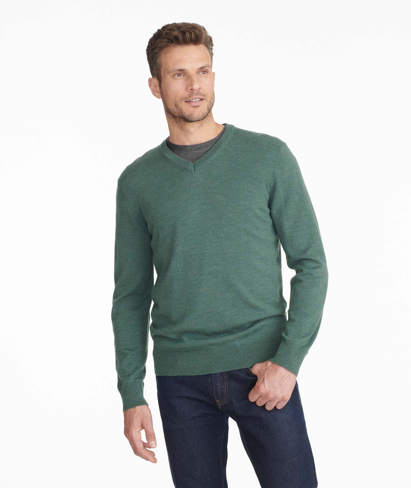Model wearing a Dark Green Merino-Wool V-Neck Sweater