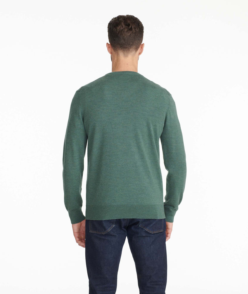 Model wearing a Dark Green Merino-Wool V-Neck Sweater