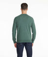 Model wearing a Dark Green Merino-Wool V-Neck Sweater