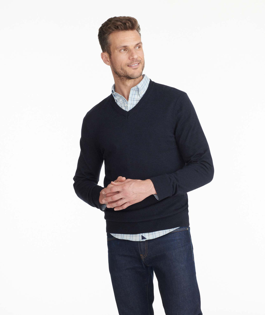 Model wearing a Navy Merino Wool V-Neck Sweater
