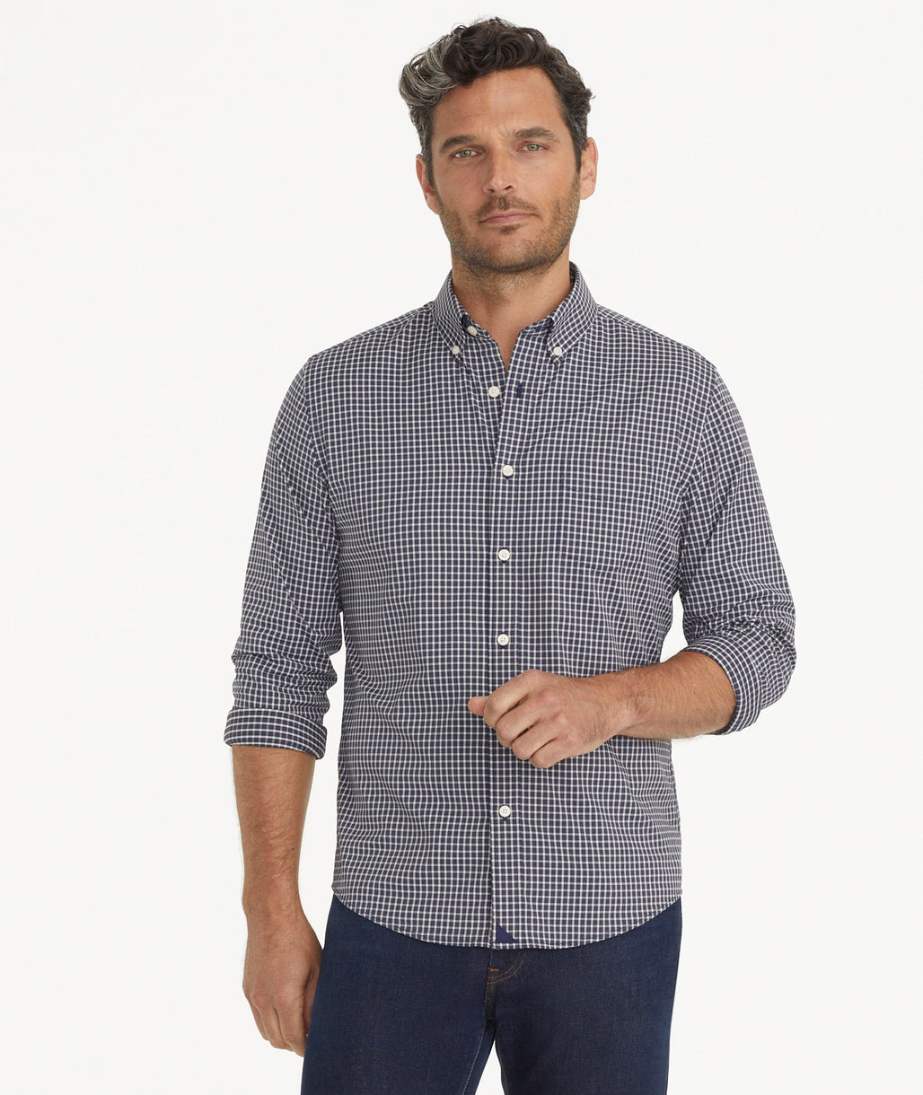 Model is wearing UNTUCKit Wrinkle-Free Performance Tully Shirt inNavy & Red Check.
