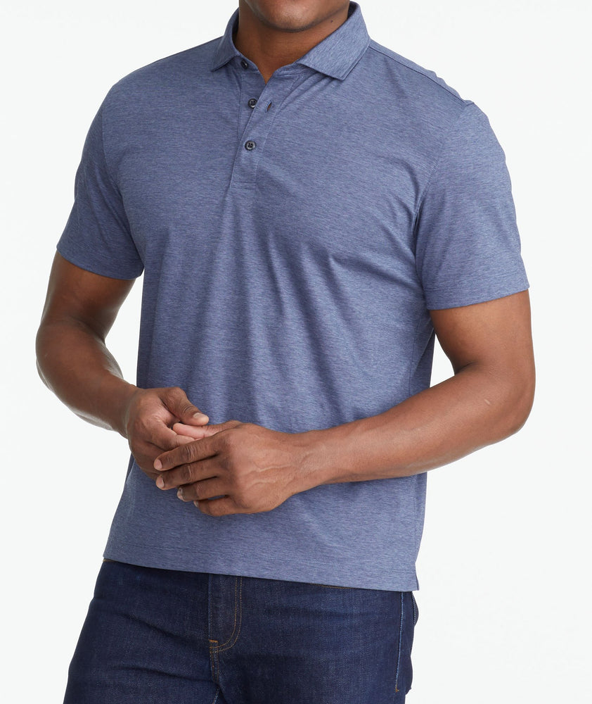 A model wearing a Navy Luxe Wrinkle-Free Pique Polo