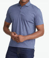 A model wearing a Navy Luxe Wrinkle-Free Pique Polo