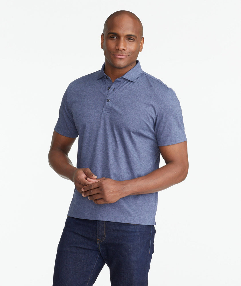 A model wearing a Navy Luxe Wrinkle-Free Pique Polo