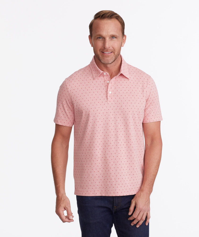 Model wearing a Pink Wrinkle-Free Polo with Williams Print