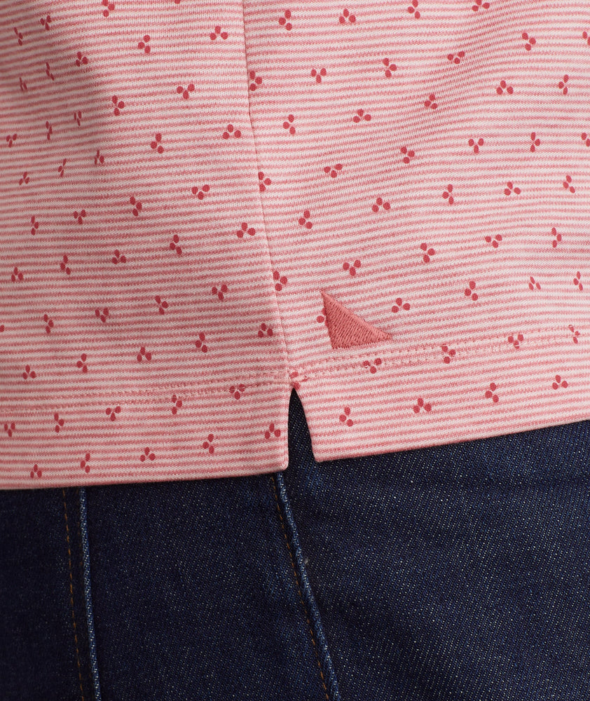 Model wearing a Pink Wrinkle-Free Polo with Williams Print