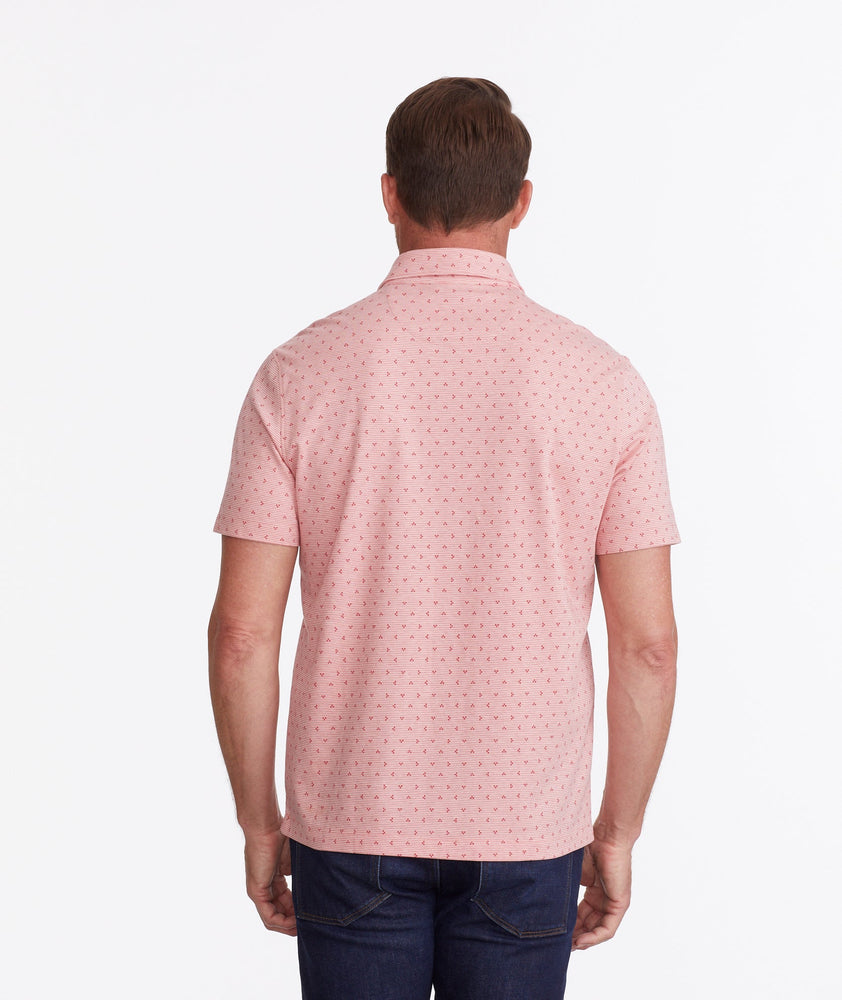 Model wearing a Pink Wrinkle-Free Polo with Williams Print