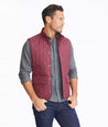 Model wearing a Dark Red Quilted Field Vest