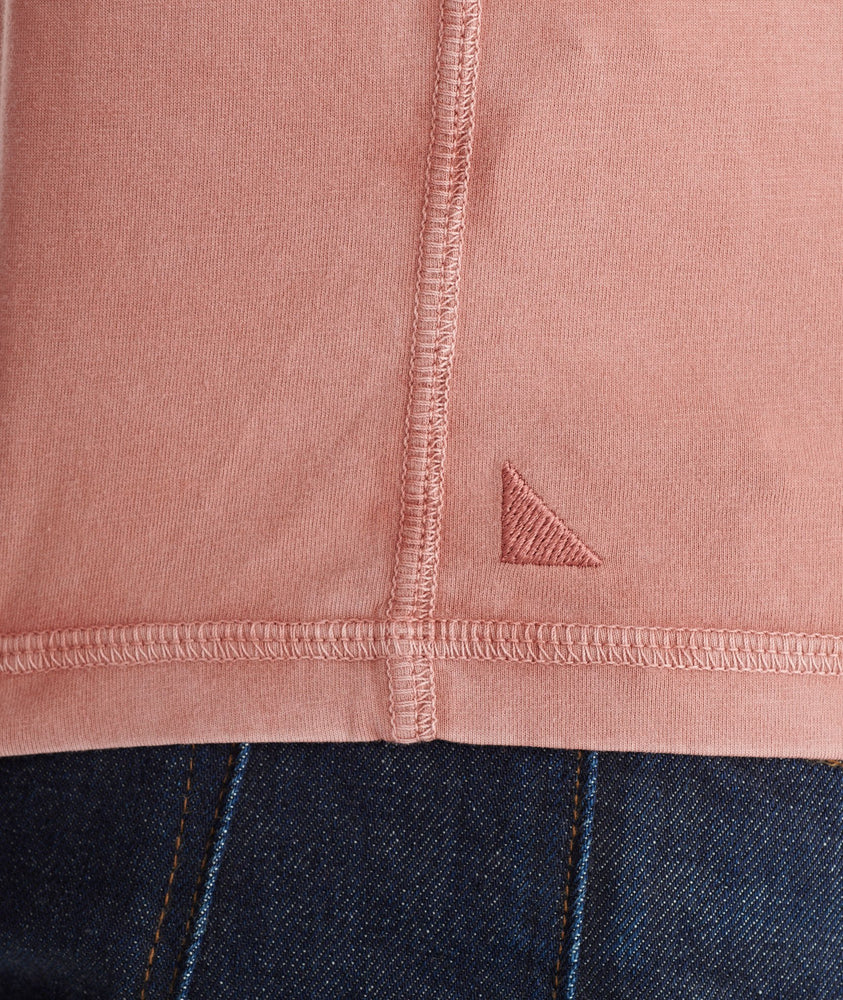 Model wearing a Light Red Long-Sleeve Pima Cotton Henley